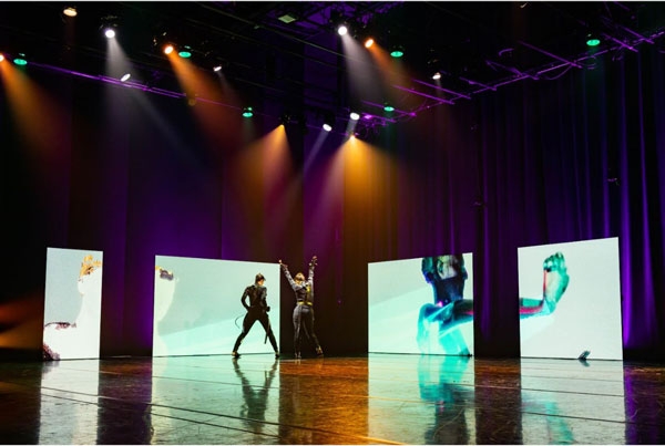 Image of dancers on stage from the performance of The Wilds.