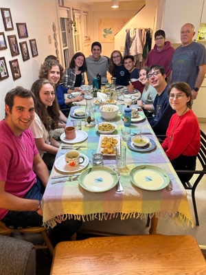 Hebrew Language and Culture Club students, staff, and faculty enjoying dinner.