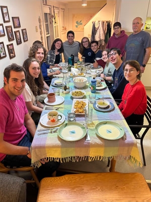 Hebrew Language and Culture Club students, staff, and faculty enjoying dinner.
