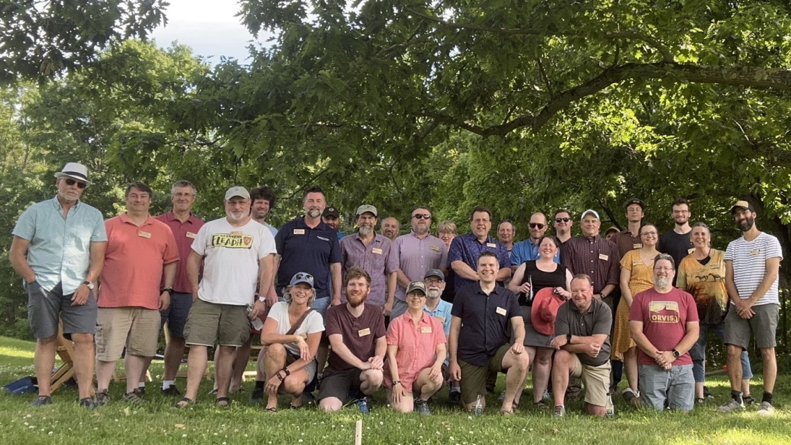 The ITS teams gathers at their annual summer picnic.