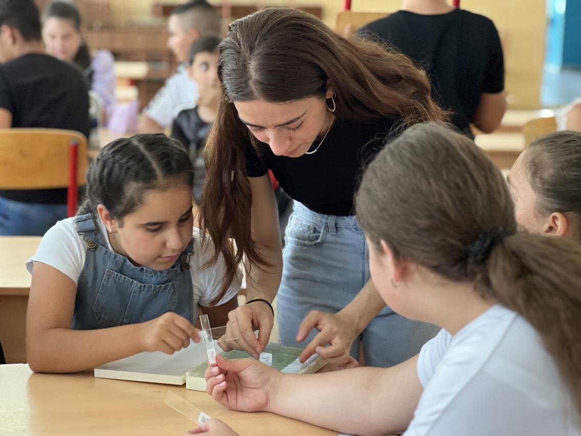 Anush Margaryan teaches students at a STEM camp in Armenia.