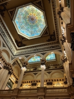 View of an ornate building and a colorful window
