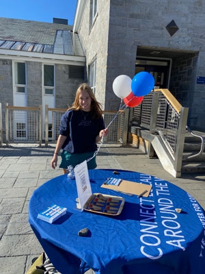 MiddVote station set up by students outside Proctor Dining Hall.