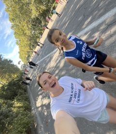 Two runners taking a selfie in the park
