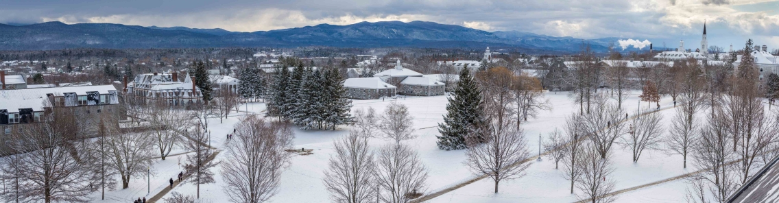 panorama drone shot of Middlebury campus covered in snow in the winter