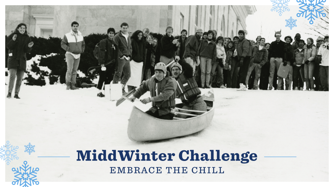 Middlebury students in sledding down the hill in a canoe