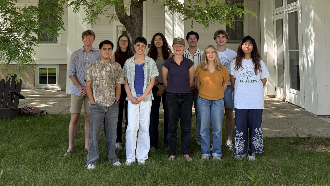 Group of SSL interns standing in front of the Franklin Environmental Center at Hillcrest smiling