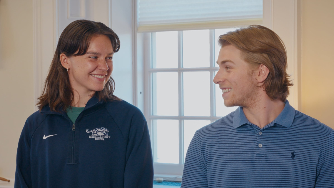 Two Students Smiling at each other