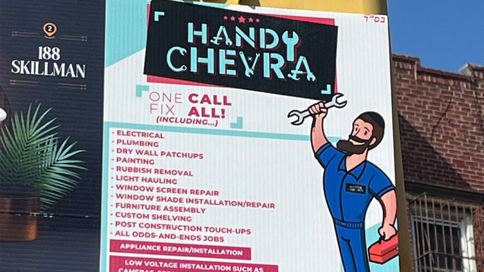 Billboard advertising a handyman.