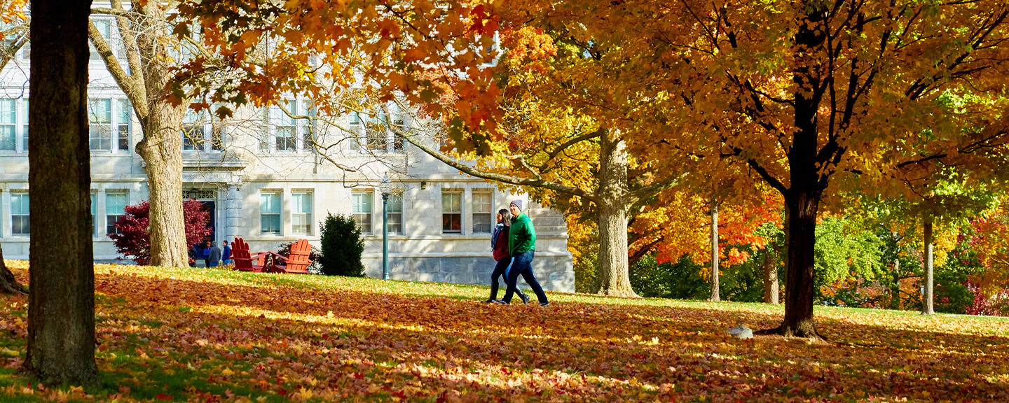 People Walking Across Campus During Fall