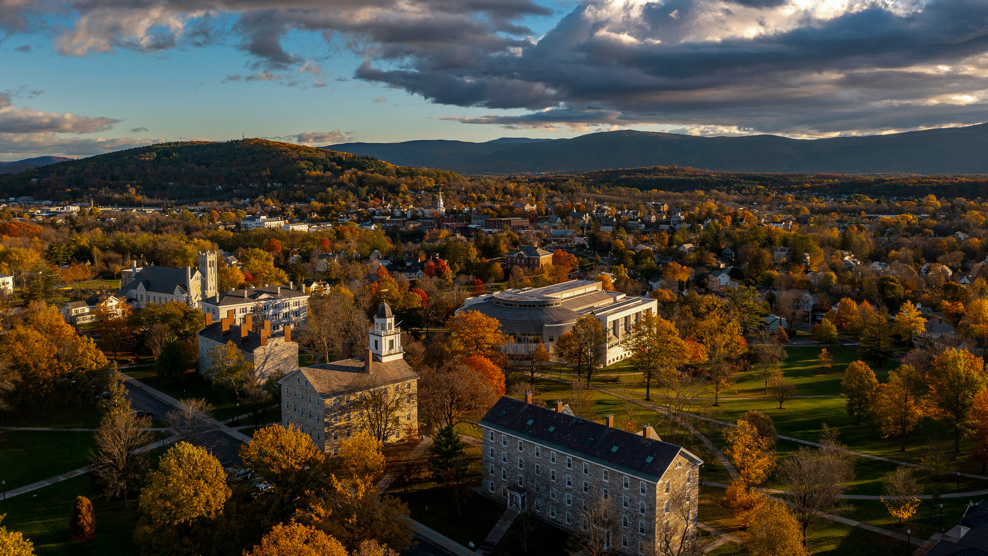 Aerial view of campus overlooking the town of Middlebury and the Green Mountains. 