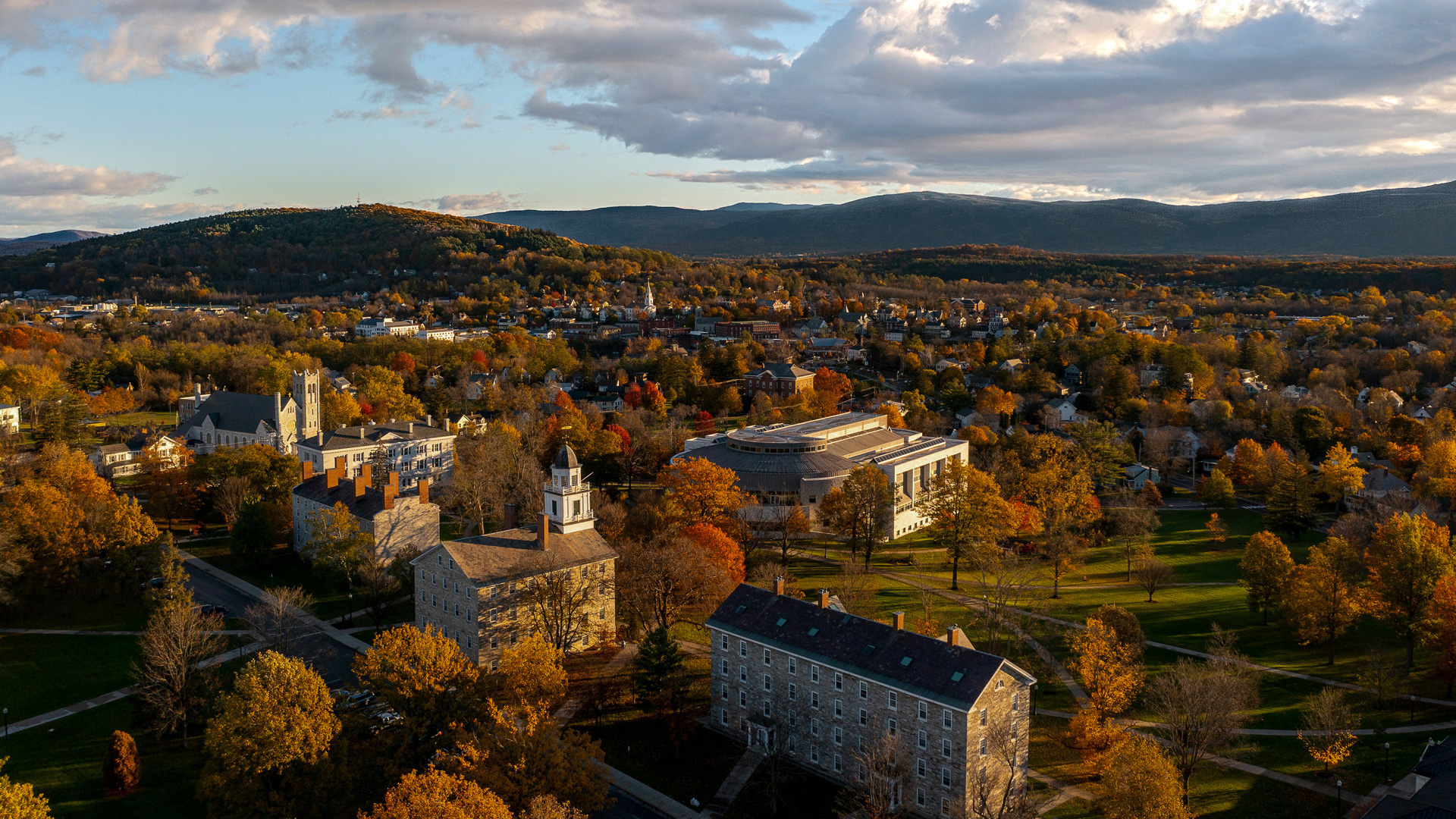 Aerial view of campus overlooking the town of Middlebury and the Green Mountains. 