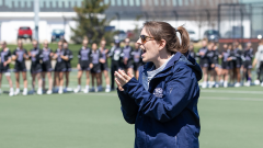 Photo of Coach Danni Ellis Cheering on the LAX team