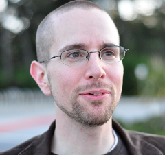 headshot of Dan Bouk with glasses