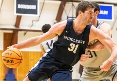 Alex Sobel ’23 playing in a basketball game