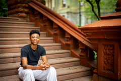 Tamir Williams ’16 sitting on steps