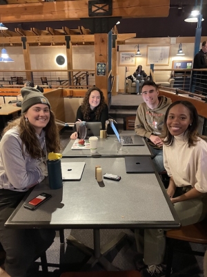 Group of RGF students around table.