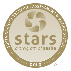 STARS report gold badge with "sustainability tracking, assessment, and rating system" and "a program of AASHE written on it