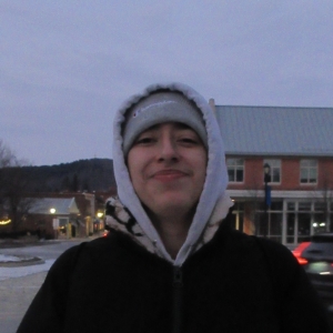 Student wearing a hood