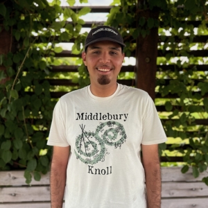Josue, standing in the Middlebury Knoll garden