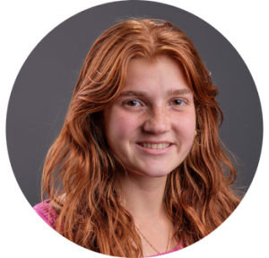 Student smiling at camera