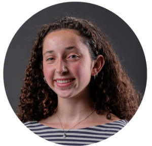 Student smiling into camera