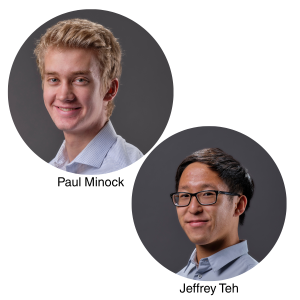 Two men smiling