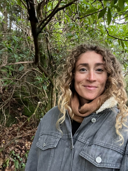 photo of Tara Federoff with trees and greenery in background