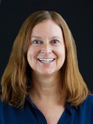 Kristi Brennan in navy blouse