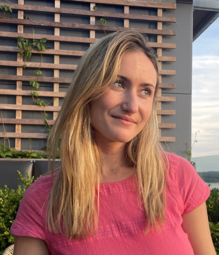  woman with blond hair looking to the distance