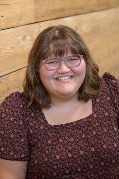 Lady with glasses, hair to shoulders