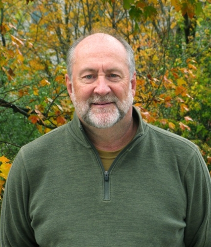 man with salt and pepper short beard
