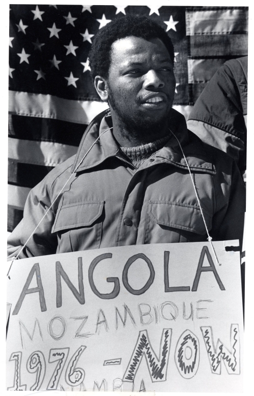 Student with protest sign at Middlebury College, 1986.