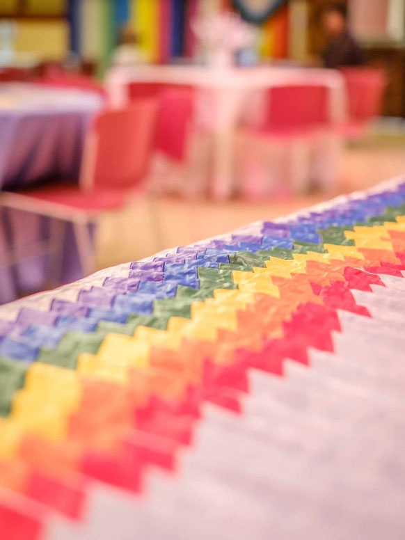 Lavender Graduations sashes on a table.