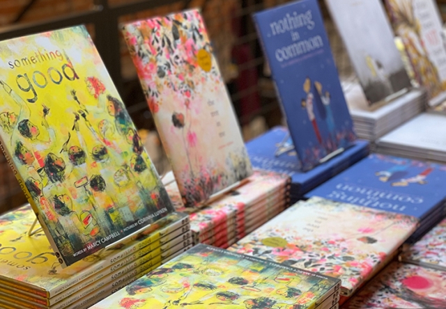 Various books presented on a table