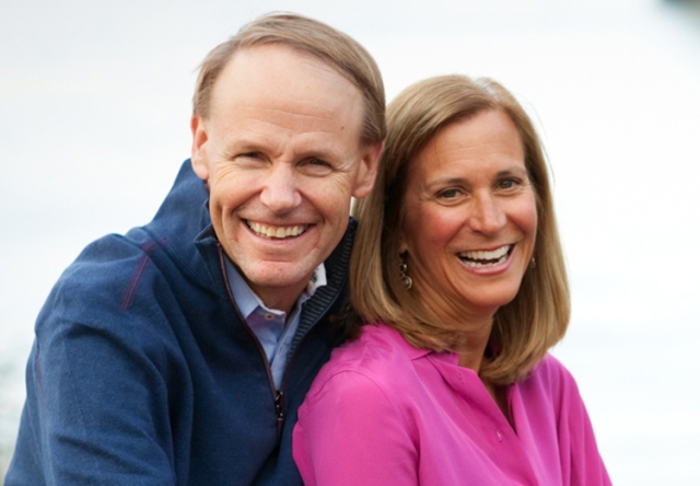 Portrait of Ted and Kathy Truscott smiling and looking into the camera