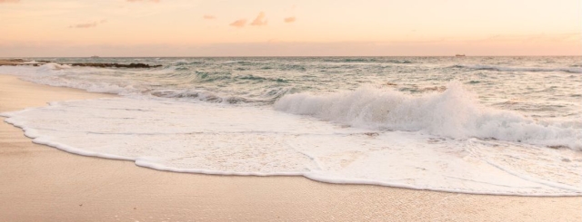 beach scene with peach and grey tones