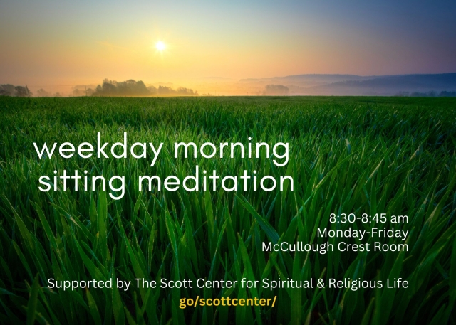 text against bright green grass with sunrise in the background