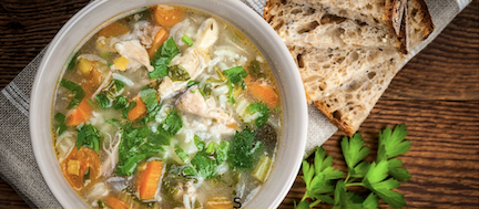 soup and bread on brown wooden table