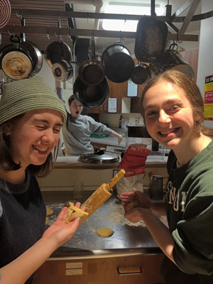 Students cooking together for Hillel hamantaschen.