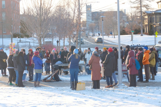 Group stands outside at College Park on a winter day.