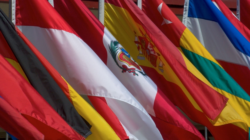 A close cropped capture of the numerous country flags that fly on the Middlebury Institute campus.