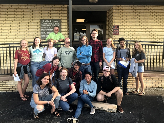 The Young Leaders for Wild Florida stand outside of the County Commission of Bradford County, Florida