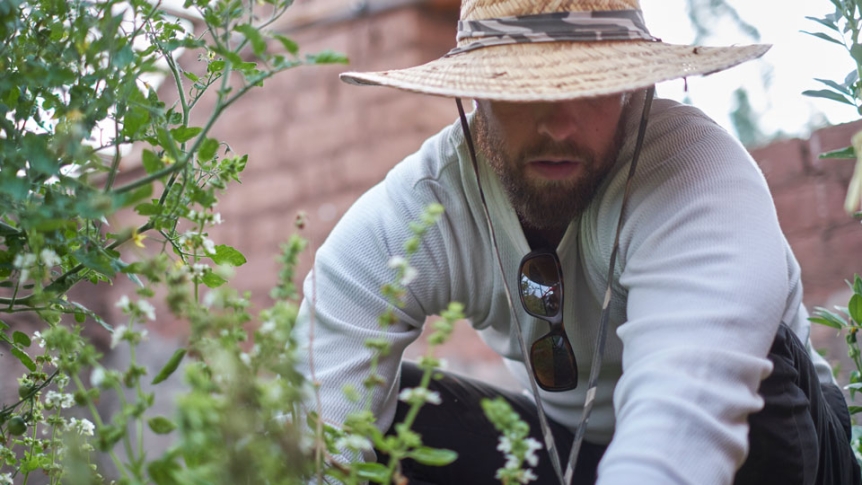 A man works in a garden in rural China.