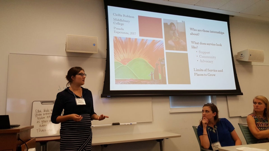 A student makes a presentation after her internship.