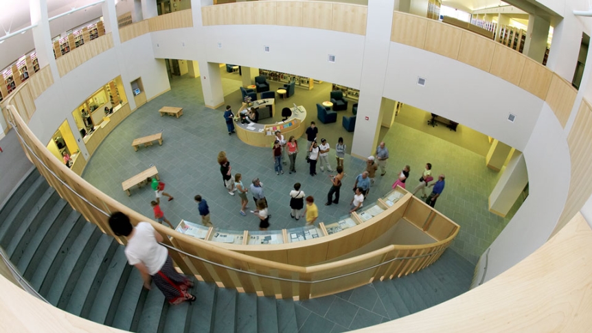 A view of the Davis Library lobby from the second floor staircase.