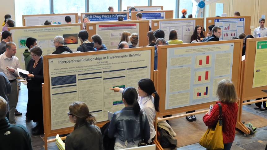 A view of presenters in the great hall during the Spring Student Symposium.