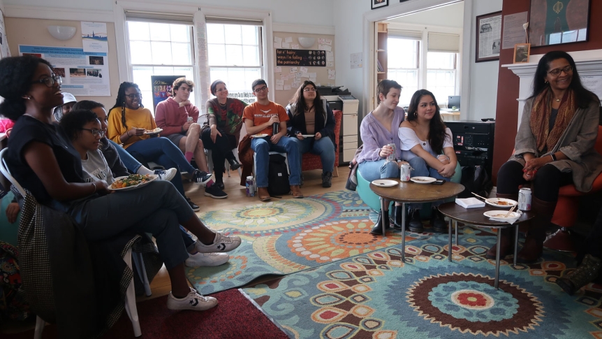 Students gather for a book discussion with guest lecturer Emily Bernard.