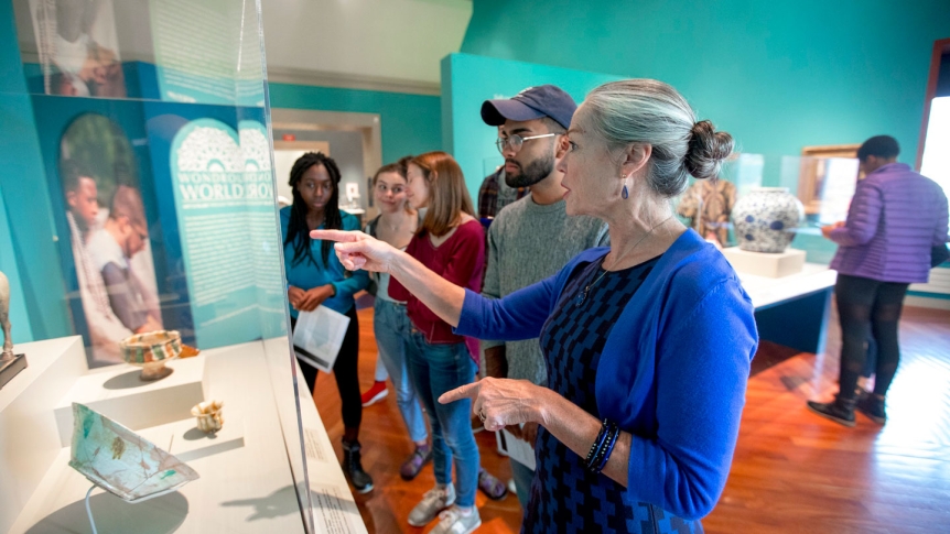 Cynthia Packert with students in the Museum.