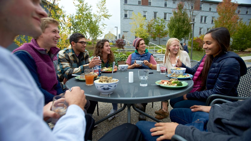 Students eating outdoors.